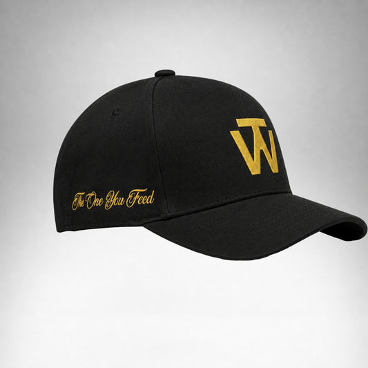 Black Two Wolves cap with gold embroidered logo worn