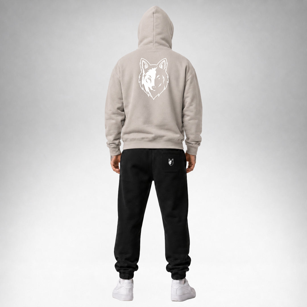 Mushroom Two Wolves Staple pullover hoodie shown from the back wearing by a male model.