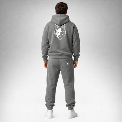 Shadow Two Wolves Staple pullover hoodie shown from the back wearing by a male model.