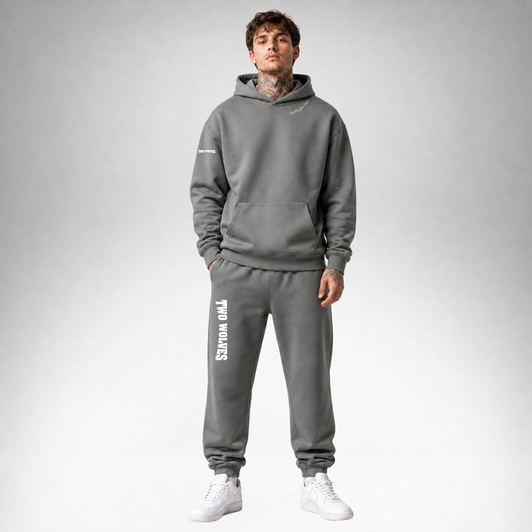 Shadow Two Wolves Staple pullover hoodie shown from the front wearing by a male model.