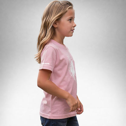 Girl wearing a pink Two Wolves Cub Staple T-shirt with a white wolf graphic, facing sideway.